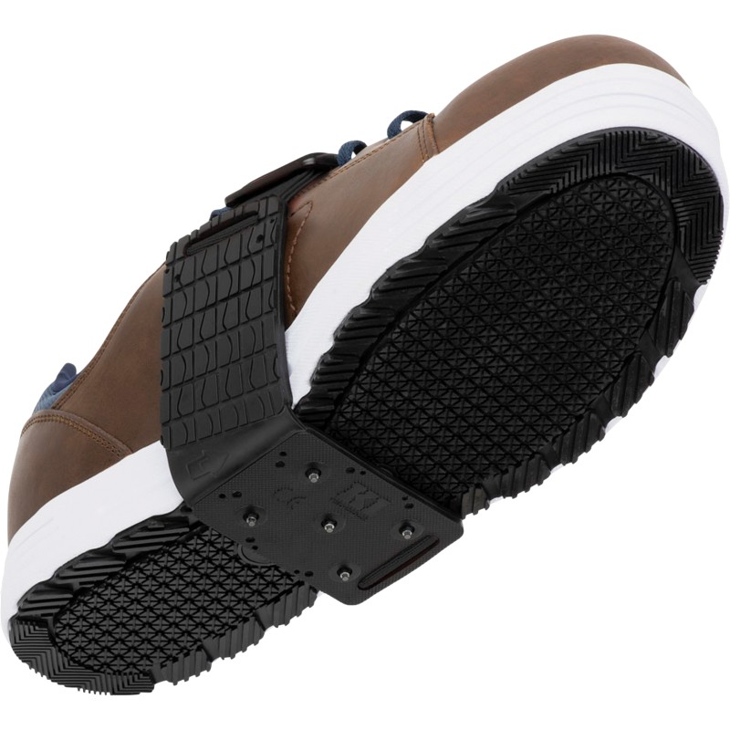 Sécurité sur glace avec crampons profil mince : confort, stabilité et design compact pour marcher sans glisser en hiver.